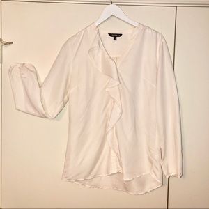 Frilly cream blouse